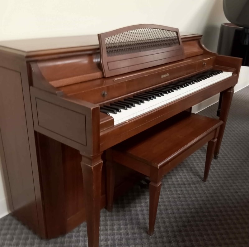 A side view of a Spinet Piano
